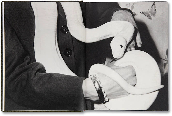 Girl Plays with Snake by Clare Strand