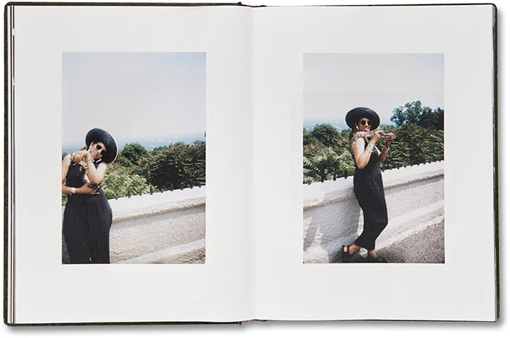 Girl Plays with Snake by Clare Strand