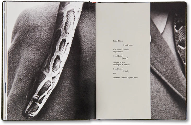 Girl Plays with Snake by Clare Strand