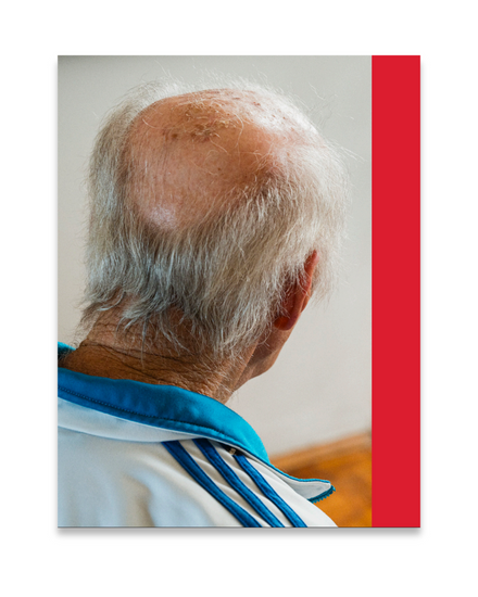 Back view of an elderly person with a red vertical stripe on a white background