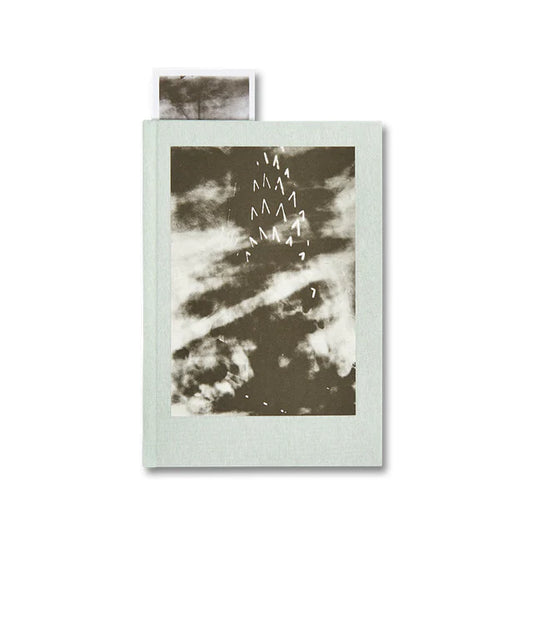 Book with a cover featuring abstract design on a white background
